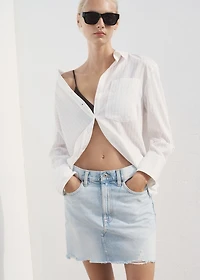 Denim skirt with frayed hem