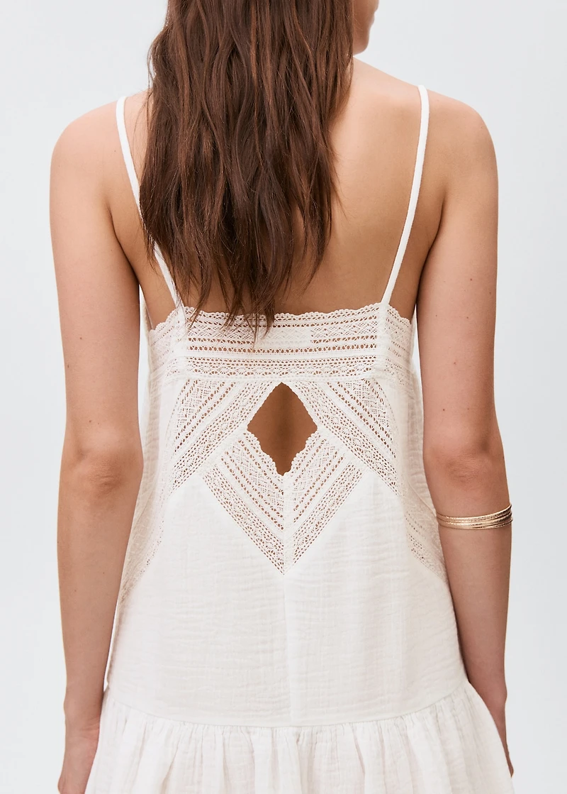 Dress with lace flounces