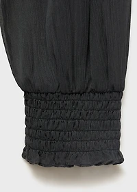 Strapless blouse with ruffled panel