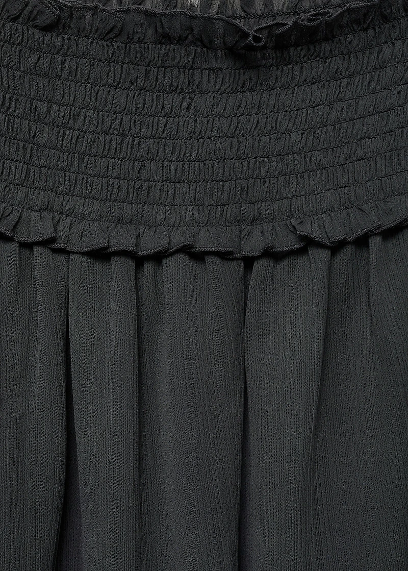 Strapless blouse with ruffled panel