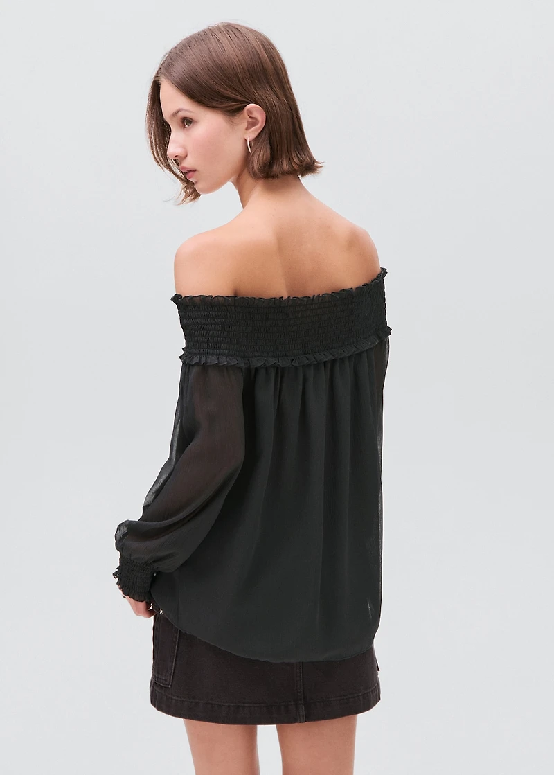 Strapless blouse with ruffled panel