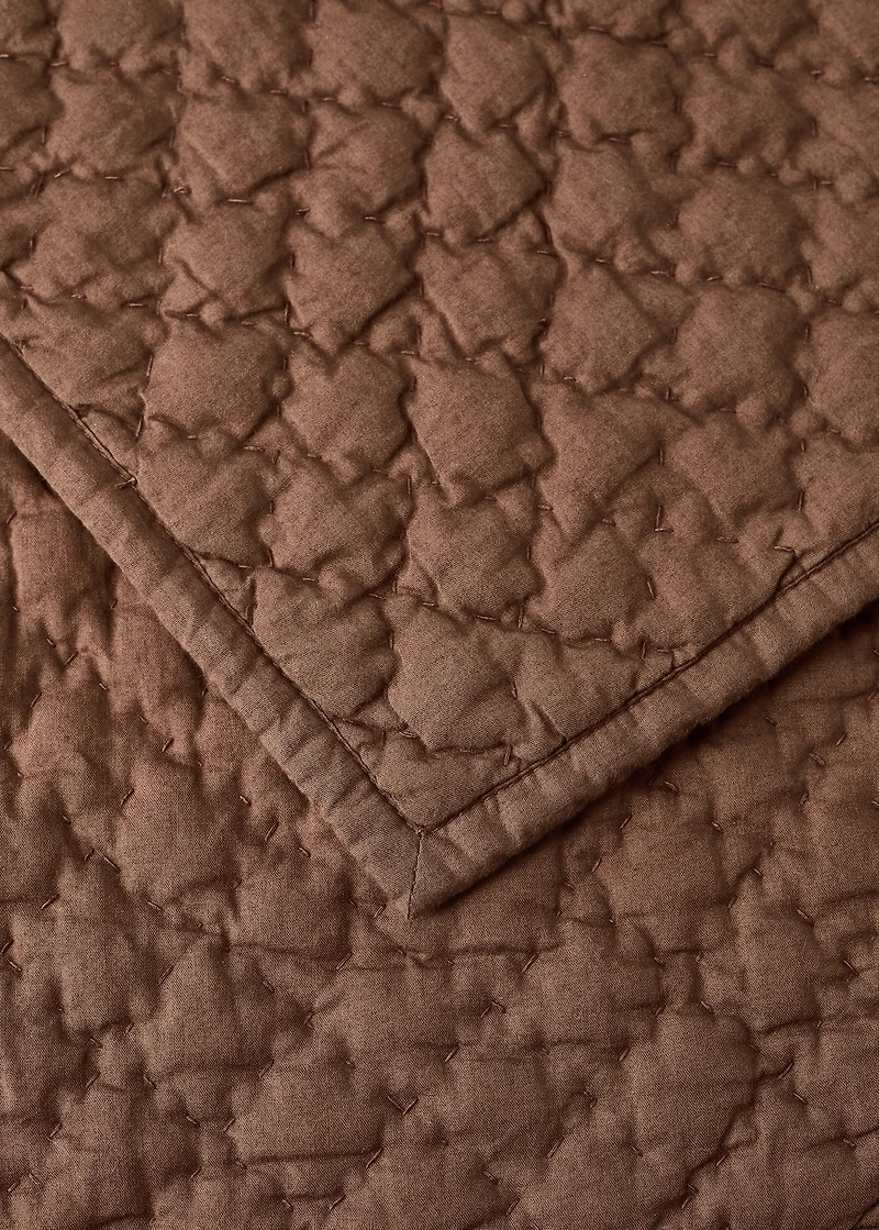 Hand-stitched cotton bedspread for mini-cot