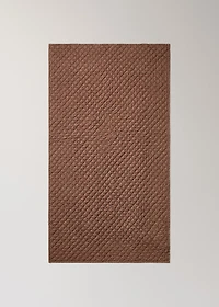 Hand-stitched cotton bedspread for mini-cot