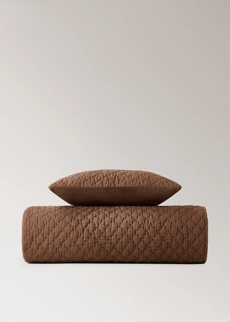 Hand-stitched cotton bedspread for mini-cot