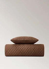 Hand-stitched cotton bedspread for mini-cot