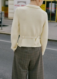 Knitted jacket with belt and buckle