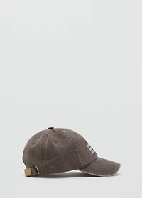 Cap with embroidered text
