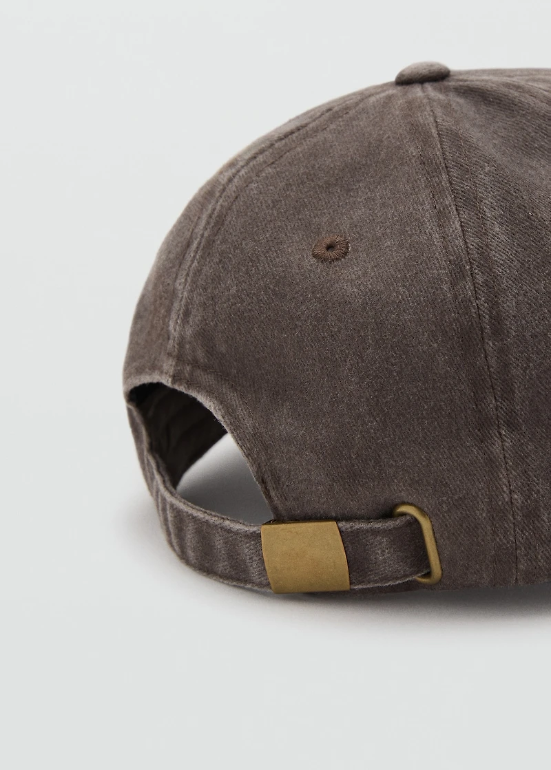 Cap with embroidered text