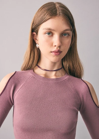 Knitted sweater with cut-out