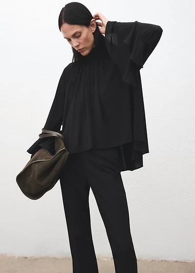 Blouse with flared sleeves and ruffles