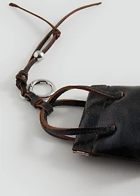 Leather handbag with keychain