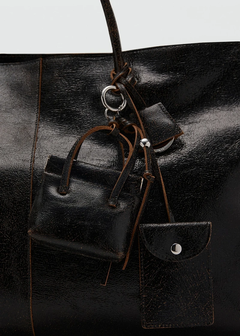 Leather handbag with keychain