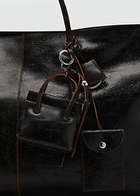 Leather handbag with keychain