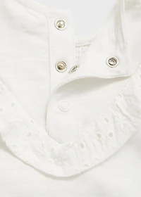 Ruffled dress and frog