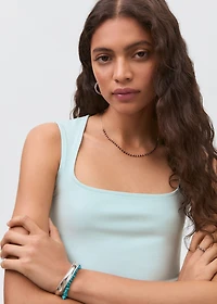 Knitted top with wide straps