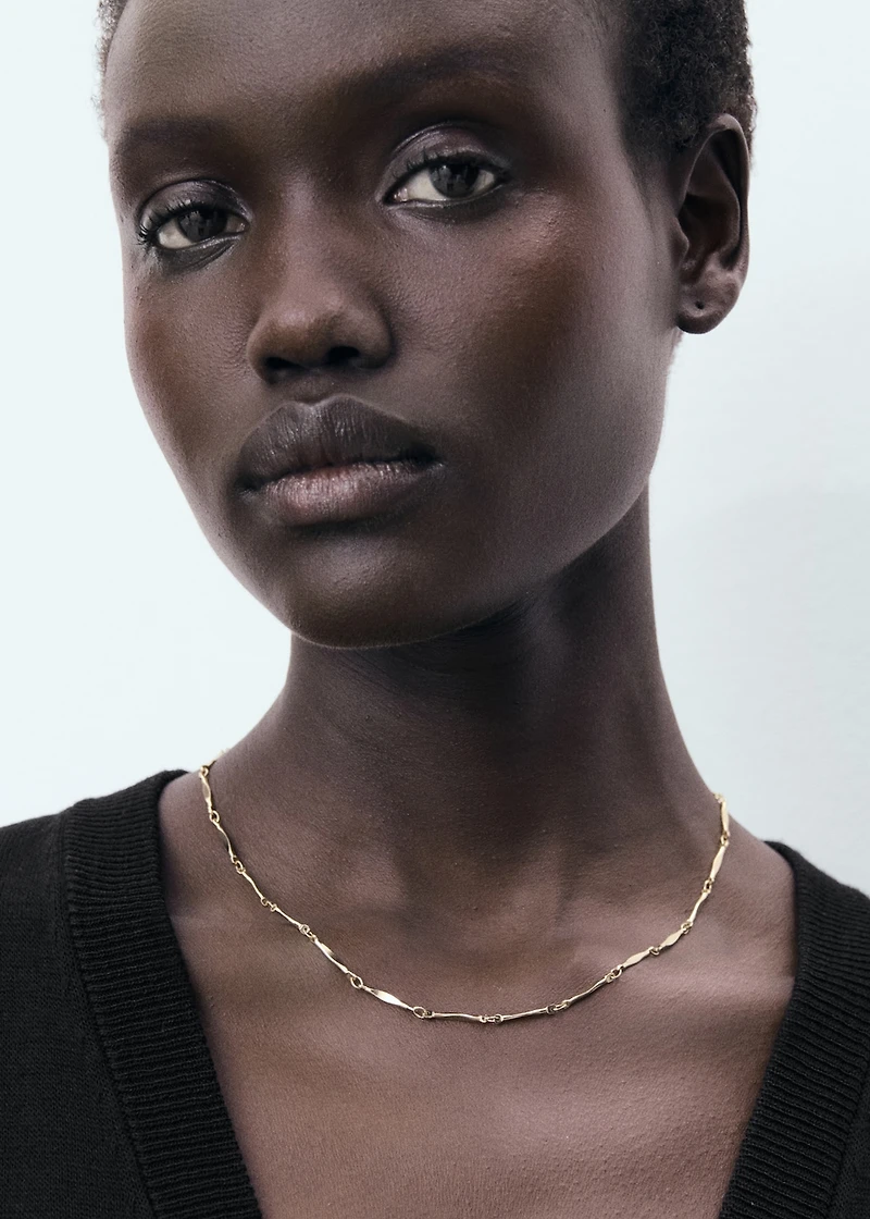 Fine-knit vest with buttons