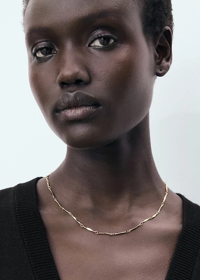 Fine-knit vest with buttons