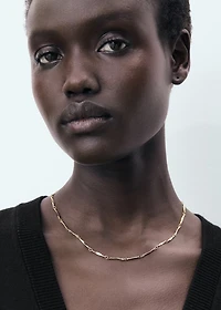 Fine-knit vest with buttons