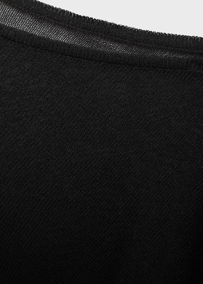 Asymmetrical knitted cape