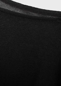 Asymmetrical knitted cape