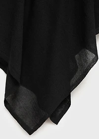 Asymmetrical knitted cape