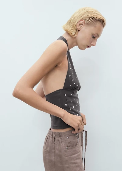 Halter top with metallic appliqués