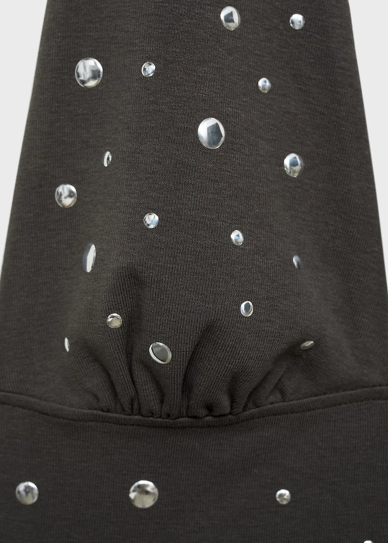 Halter top with metallic appliqués