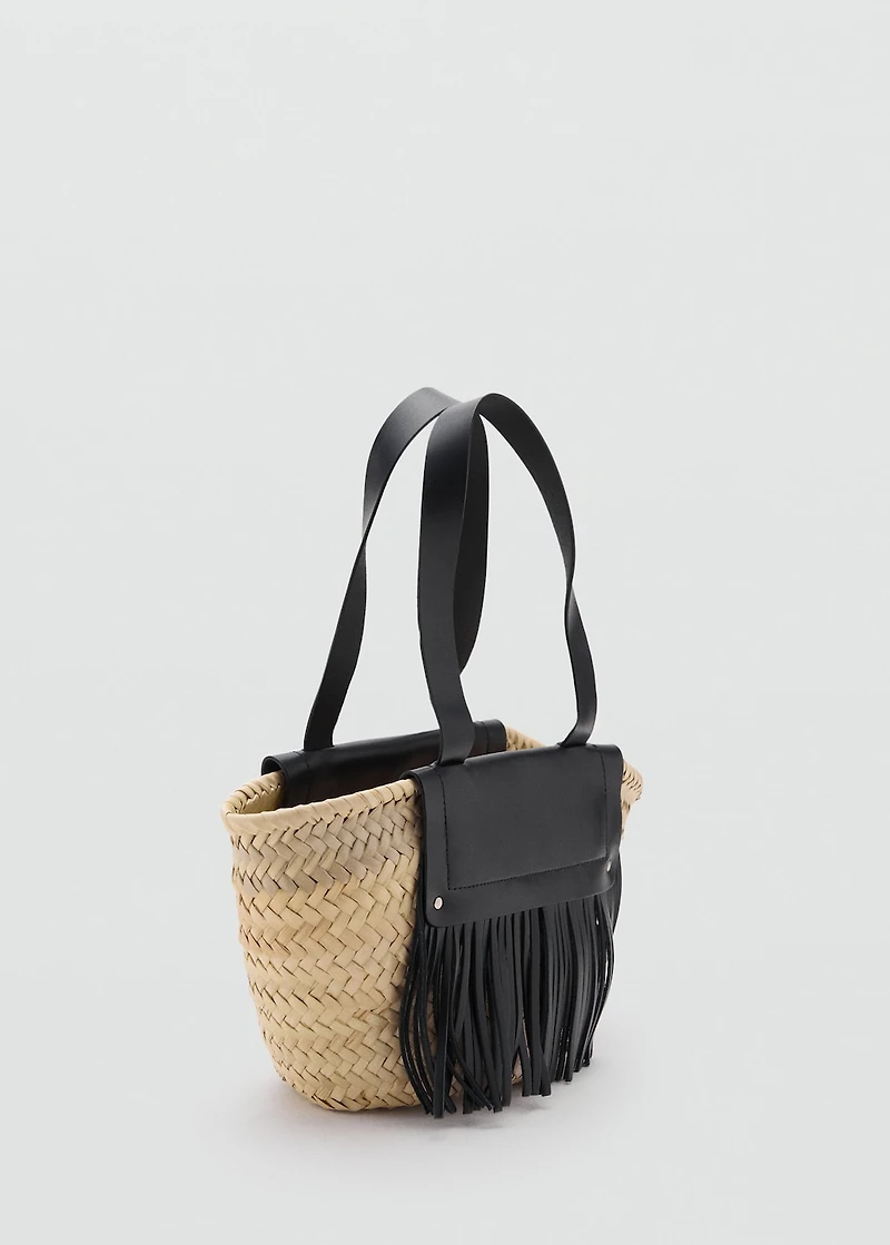 Small natural fiber basket with leather fringes