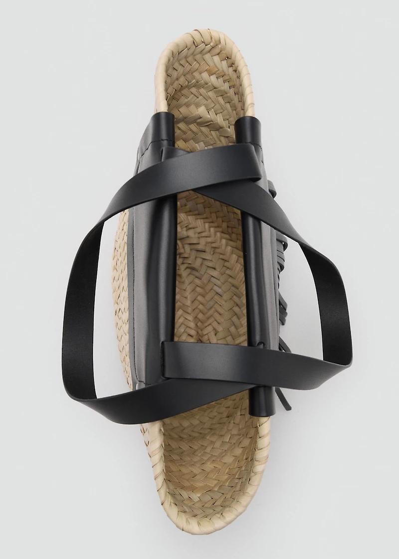 Small natural fiber basket with leather fringes