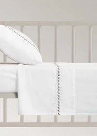 Percale cotton children's top sheet with embroidered detail for cot