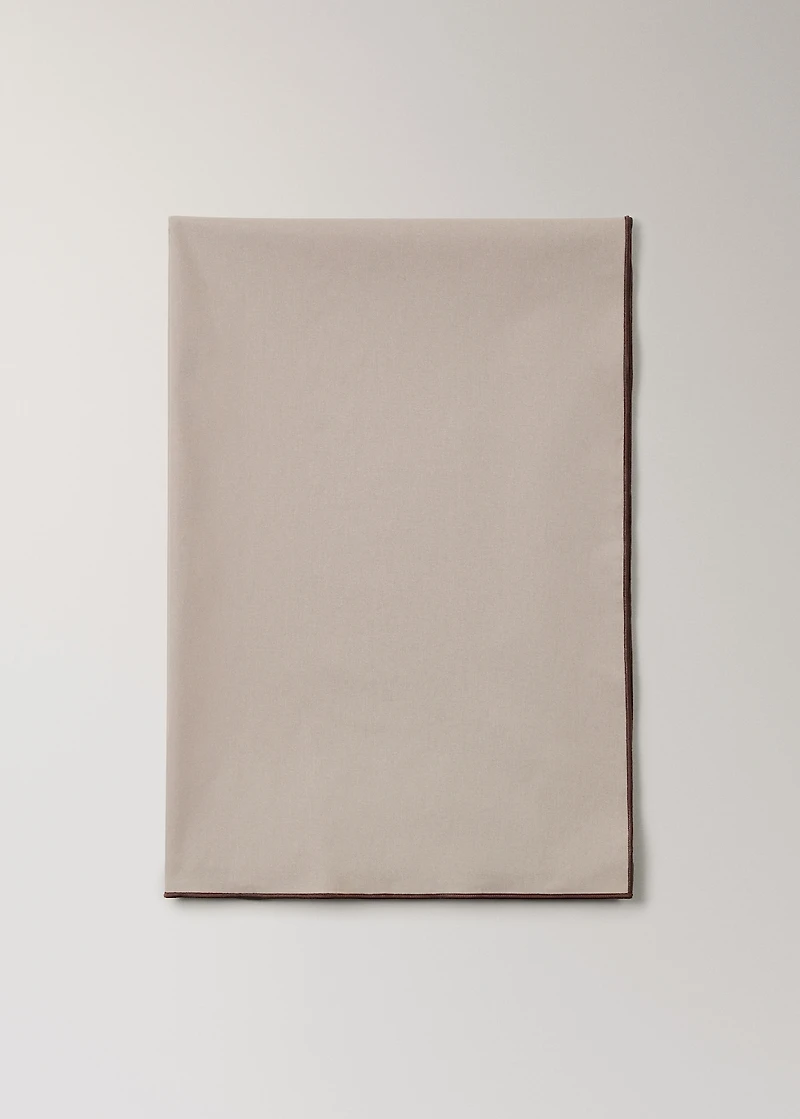 Resin-coated cotton tablecloth with overlock stitching for 8 to 10 diners