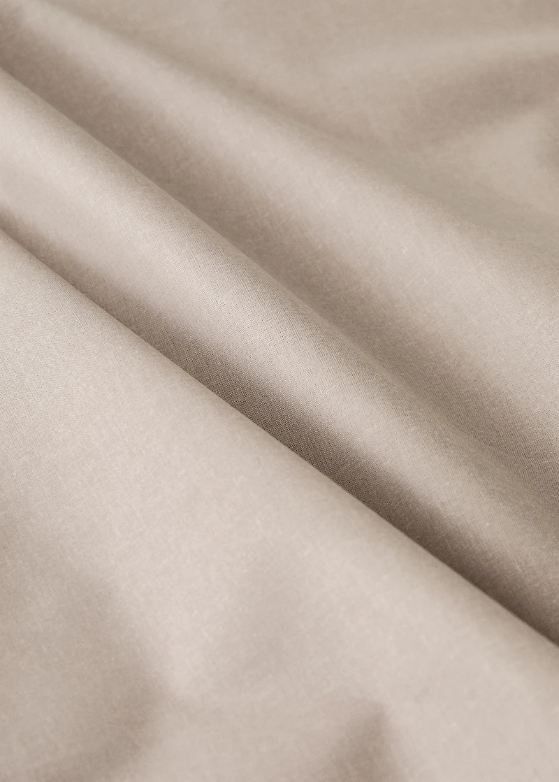 Resin-coated cotton tablecloth with overlock stitching for 8 to 10 diners