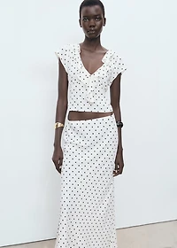 Polka-dot blouse with ruffles