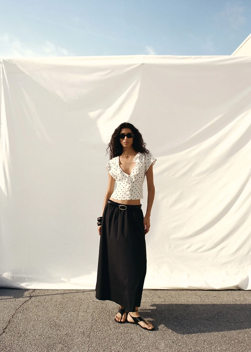 Polka-dot blouse with ruffles