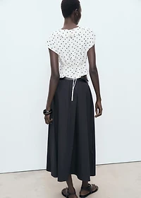 Polka-dot blouse with ruffles