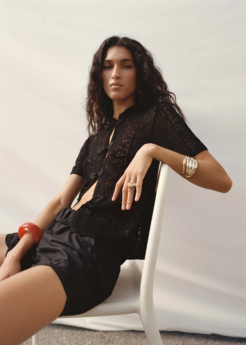 Crochet cardigan with toggle buttons