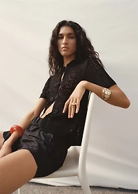 Crochet cardigan with toggle buttons