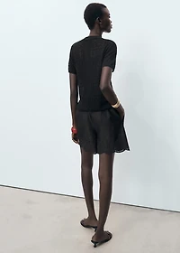 Crochet cardigan with toggle buttons