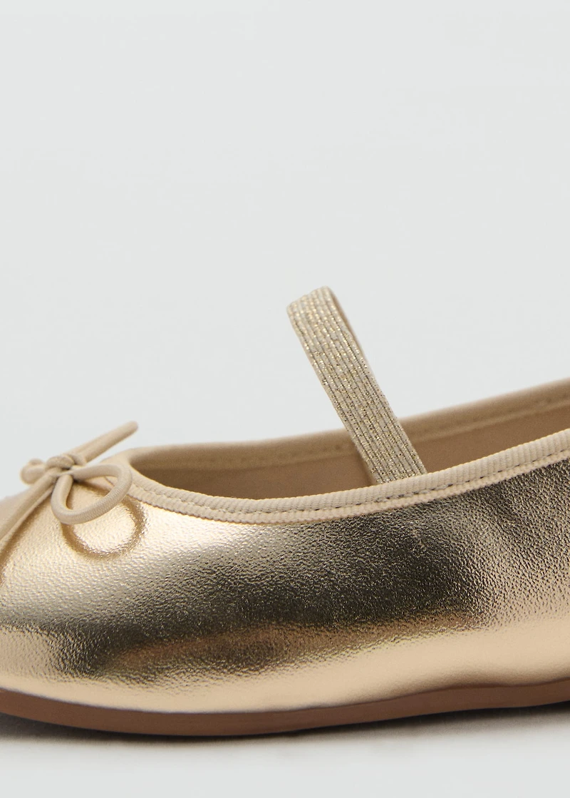 Metallic ballet flats with bow