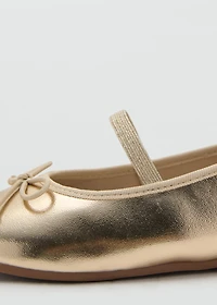 Metallic ballet flats with bow