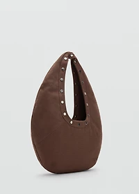 Oval studded shoulder bag