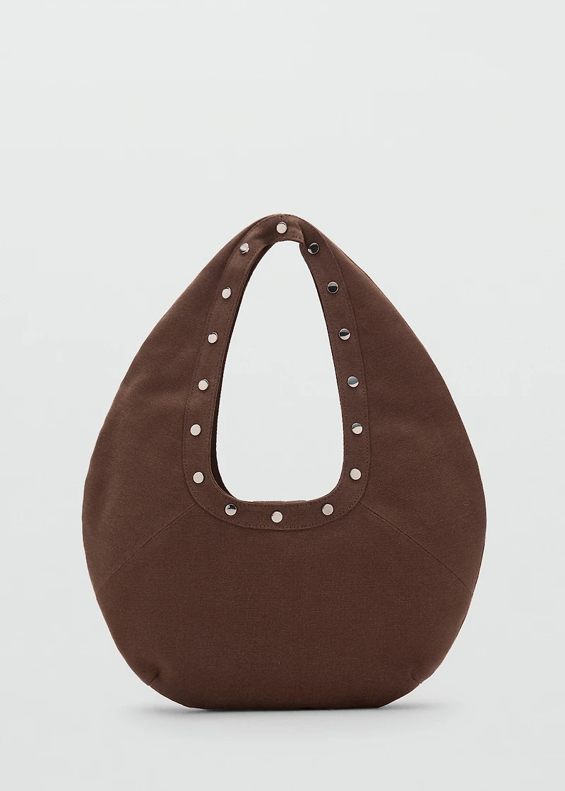 Oval studded shoulder bag