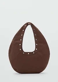 Oval studded shoulder bag