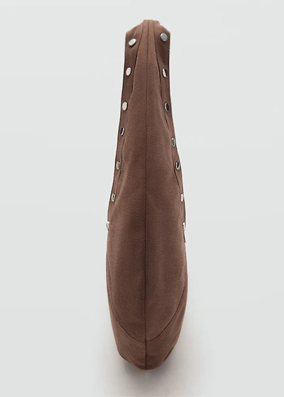 Oval studded shoulder bag