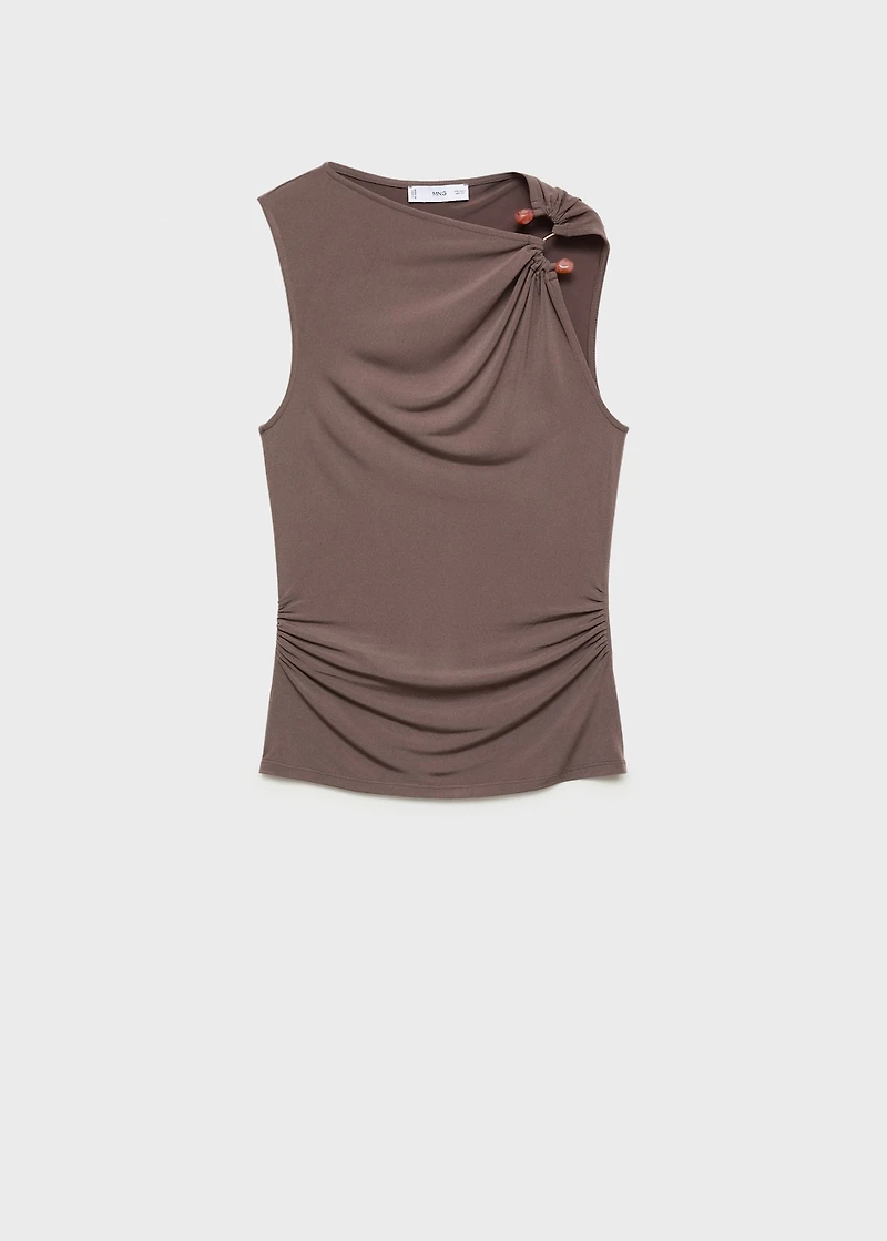 Frilly top with jewel detail