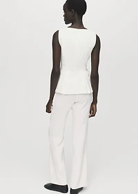 Peplum top with pleat detail