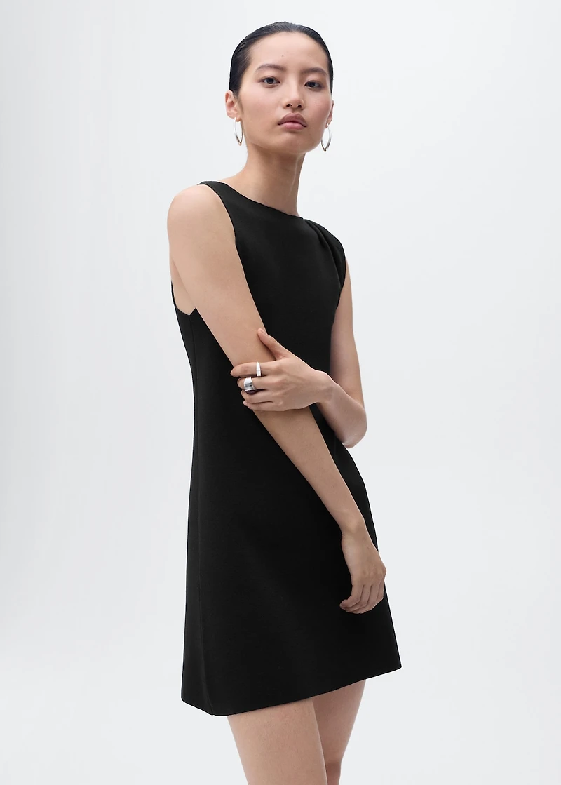 Asymmetrical knitted dress with strap