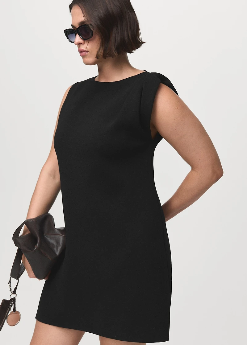 Asymmetrical knitted dress with strap