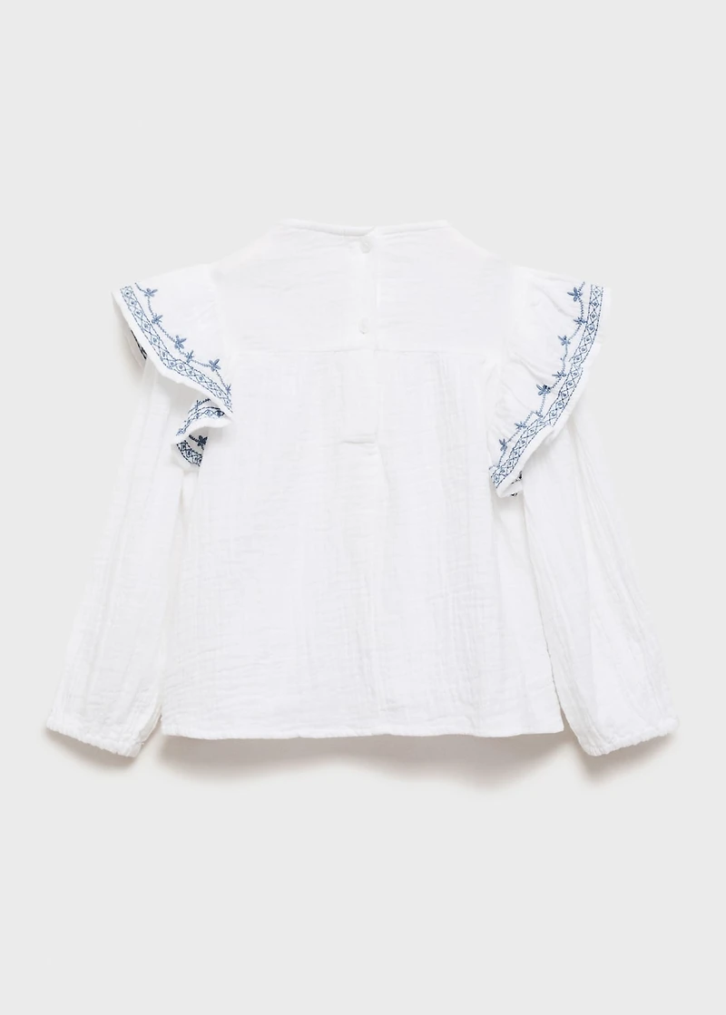Ruffled embroidered blouse