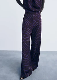 Polka dots flare trousers